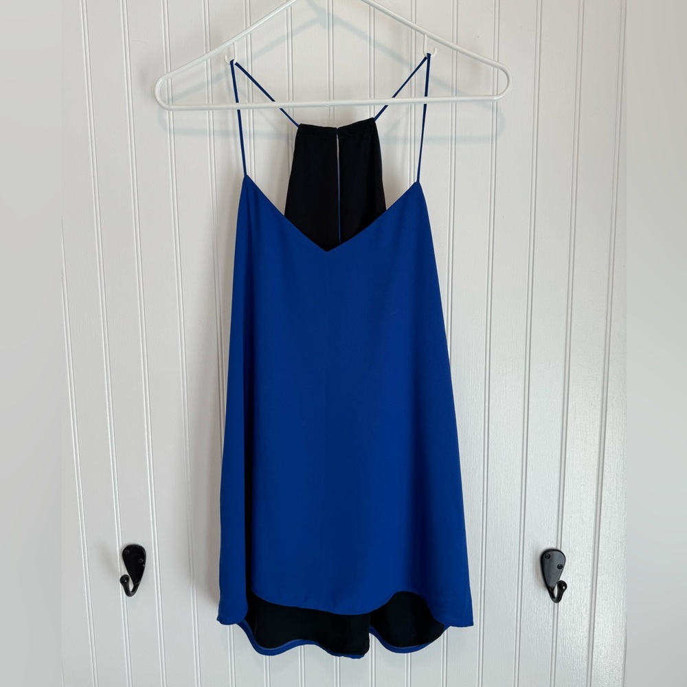 Women's blue sleeveless blouse, size medium.